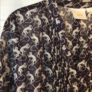 Monkey covered blue blouse